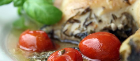 Roasted chicken with basil and cherry tomatos